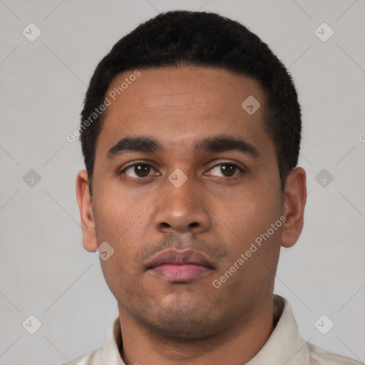 Neutral latino young-adult male with short  black hair and brown eyes