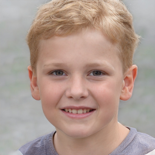 Joyful white child male with short  brown hair and grey eyes