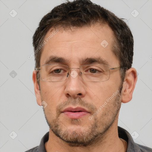 Neutral white adult male with short  brown hair and brown eyes