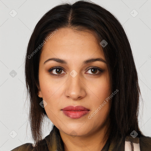 Joyful latino young-adult female with long  brown hair and brown eyes