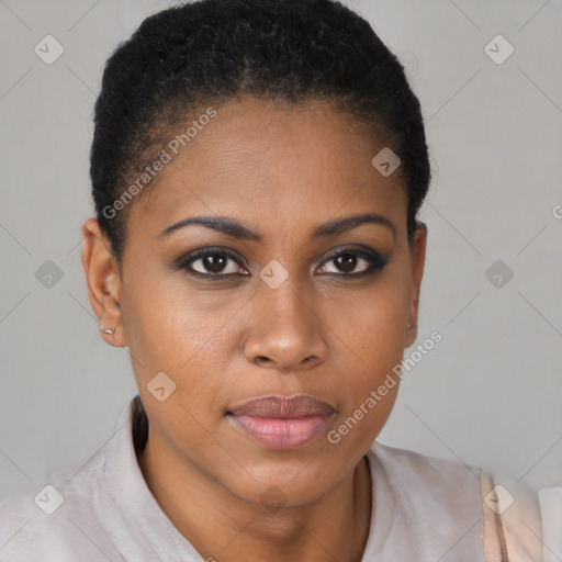 Joyful black young-adult female with short  brown hair and brown eyes