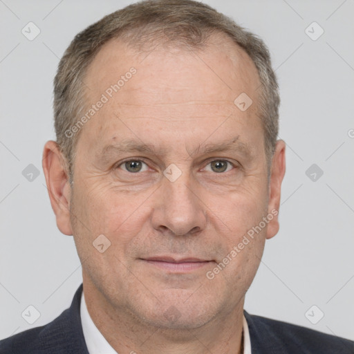 Joyful white middle-aged male with short  brown hair and brown eyes