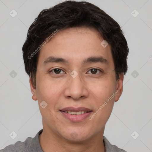 Joyful white adult male with short  brown hair and brown eyes