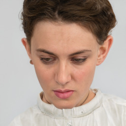 Neutral white young-adult female with short  brown hair and brown eyes