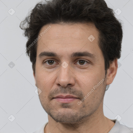 Neutral white adult male with short  black hair and brown eyes