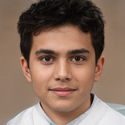Joyful white child male with short  brown hair and brown eyes
