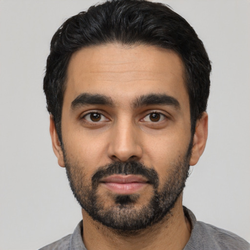 Neutral latino young-adult male with short  black hair and brown eyes
