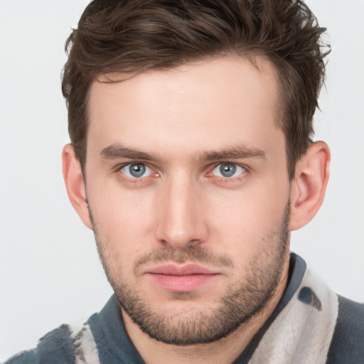 Neutral white young-adult male with short  brown hair and grey eyes