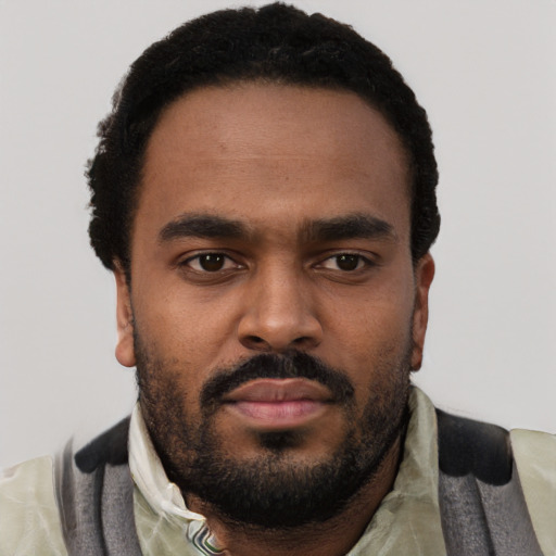 Neutral black young-adult male with short  black hair and brown eyes