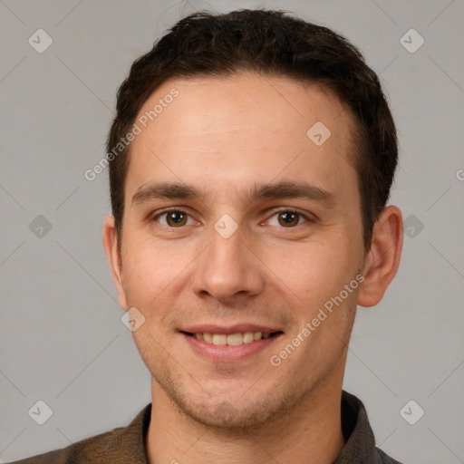 Joyful white young-adult male with short  brown hair and brown eyes