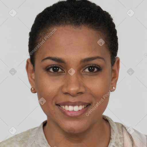 Joyful black young-adult female with short  brown hair and brown eyes