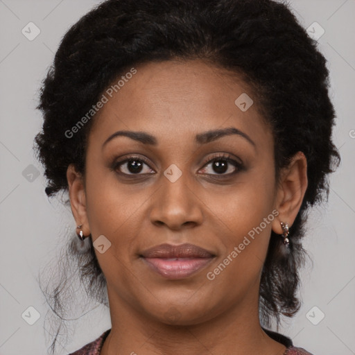 Joyful black young-adult female with medium  black hair and brown eyes