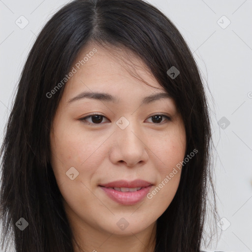 Joyful asian young-adult female with long  brown hair and brown eyes