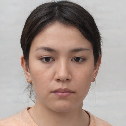 Neutral white young-adult female with short  brown hair and brown eyes
