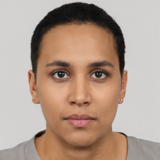 Neutral latino young-adult female with short  black hair and brown eyes