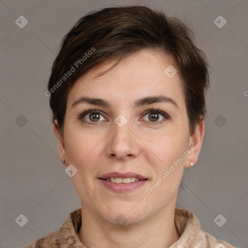 Joyful white young-adult female with short  brown hair and grey eyes