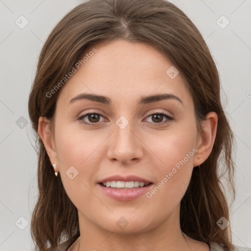 Joyful white young-adult female with medium  brown hair and grey eyes