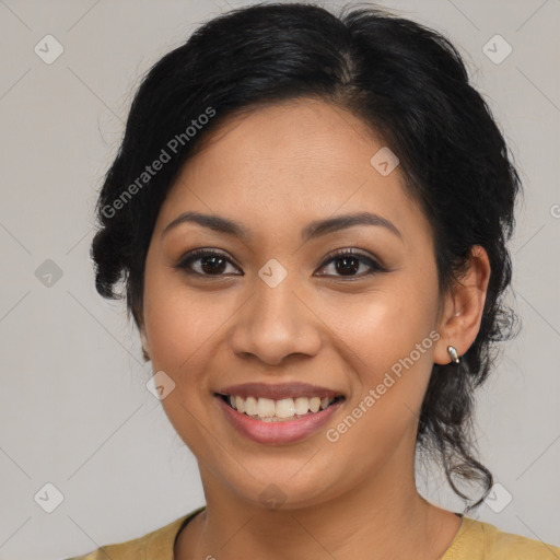 Joyful latino young-adult female with medium  black hair and brown eyes