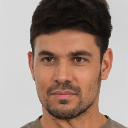 Neutral white young-adult male with short  black hair and brown eyes