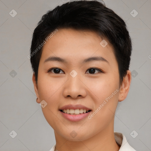 Joyful asian young-adult female with short  black hair and brown eyes