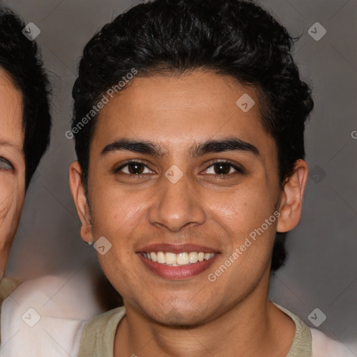 Joyful latino young-adult male with short  brown hair and brown eyes