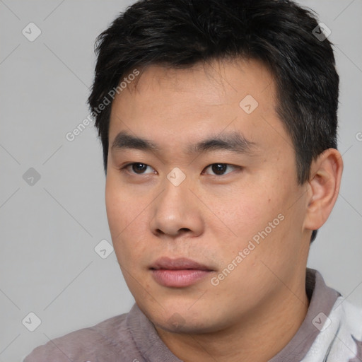 Neutral asian young-adult male with short  black hair and brown eyes