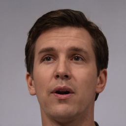 Neutral white adult male with short  brown hair and brown eyes