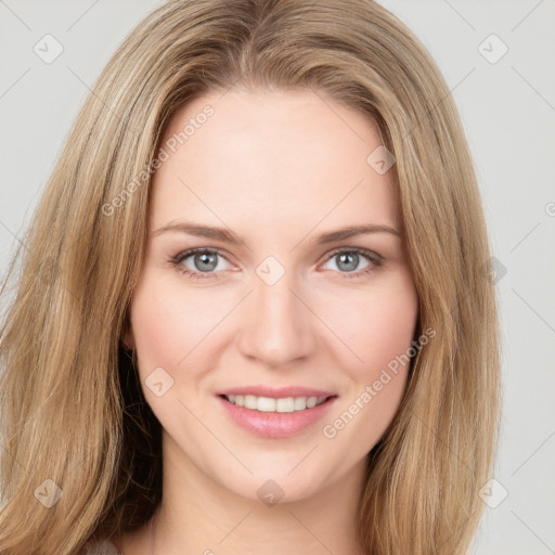 Joyful white young-adult female with long  brown hair and green eyes