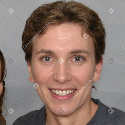 Joyful white adult female with short  brown hair and brown eyes