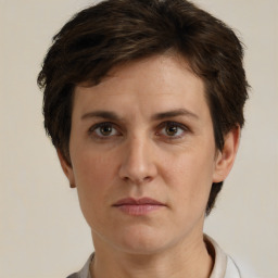 Joyful white adult female with short  brown hair and brown eyes