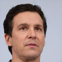 Neutral white adult male with short  brown hair and brown eyes