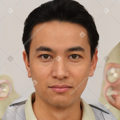 Joyful latino young-adult male with short  black hair and brown eyes