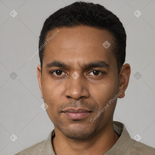 Neutral black young-adult male with short  black hair and brown eyes