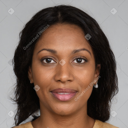 Joyful black young-adult female with medium  brown hair and brown eyes