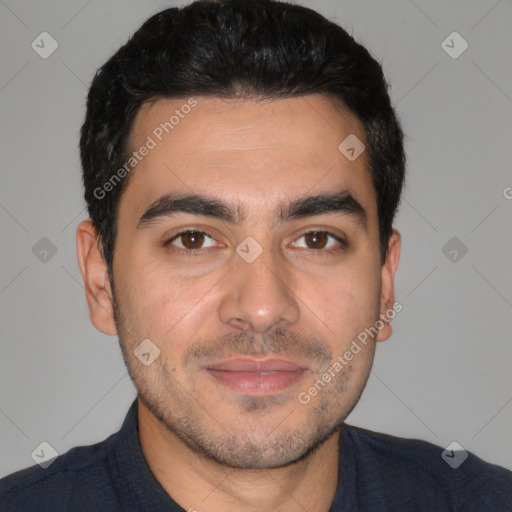 Joyful white young-adult male with short  black hair and brown eyes