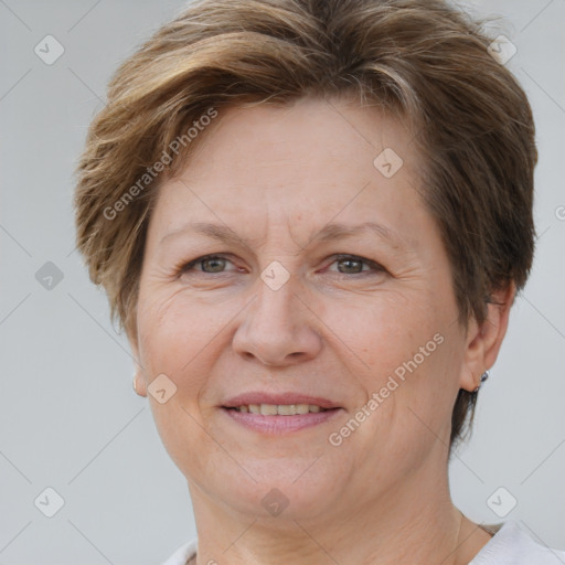 Joyful white adult female with short  brown hair and brown eyes