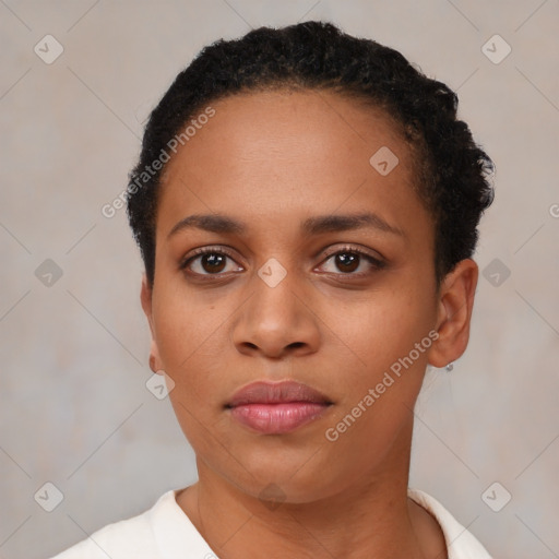 Neutral black young-adult female with short  black hair and brown eyes