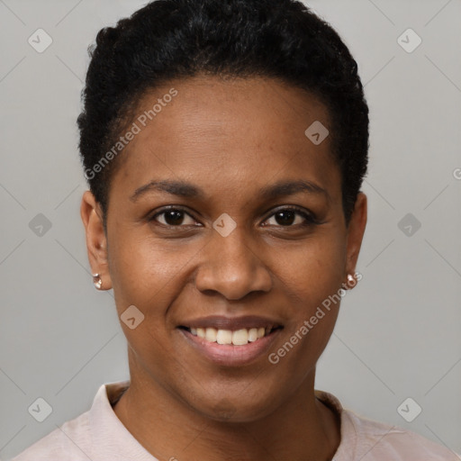 Joyful black young-adult female with short  brown hair and brown eyes