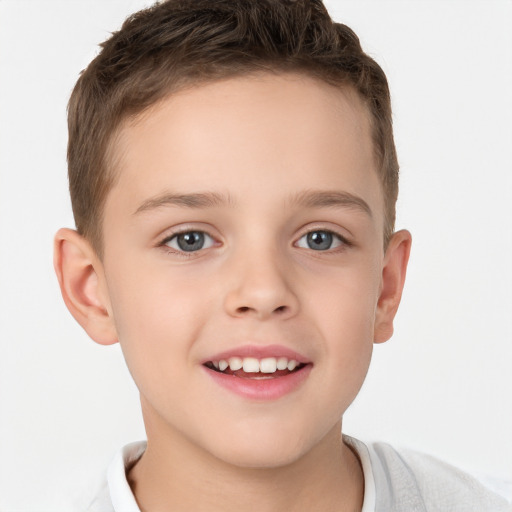 Joyful white child male with short  brown hair and brown eyes