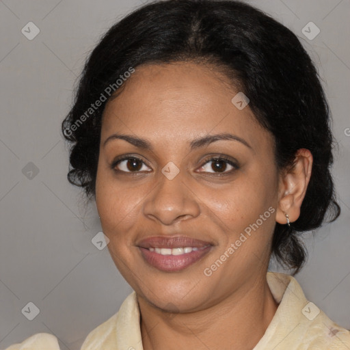 Joyful black adult female with medium  brown hair and brown eyes