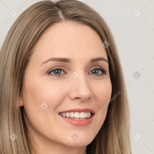 Joyful white young-adult female with long  brown hair and brown eyes