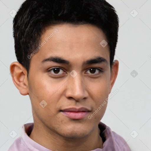 Joyful latino young-adult male with short  brown hair and brown eyes