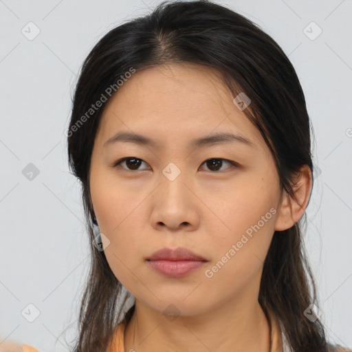 Neutral asian young-adult female with medium  brown hair and brown eyes