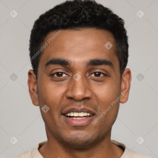 Joyful black young-adult male with short  black hair and brown eyes