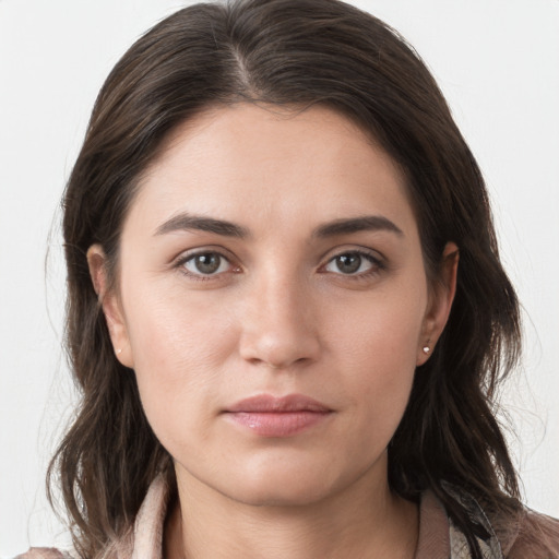 Neutral white young-adult female with long  brown hair and grey eyes