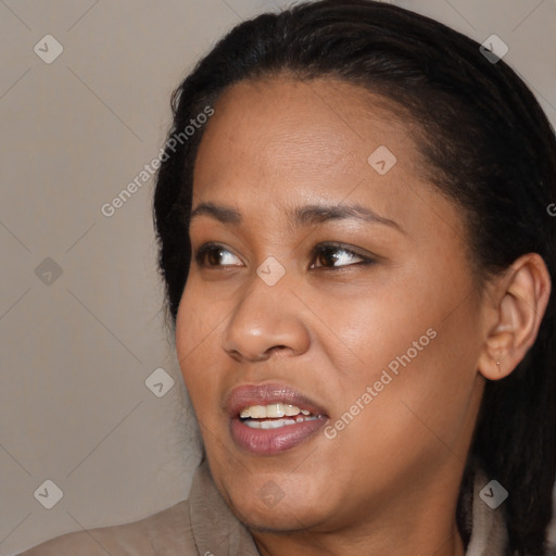 Joyful black young-adult female with medium  black hair and brown eyes