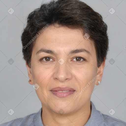 Joyful white adult female with short  brown hair and brown eyes