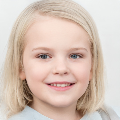 Joyful white child female with medium  brown hair and blue eyes