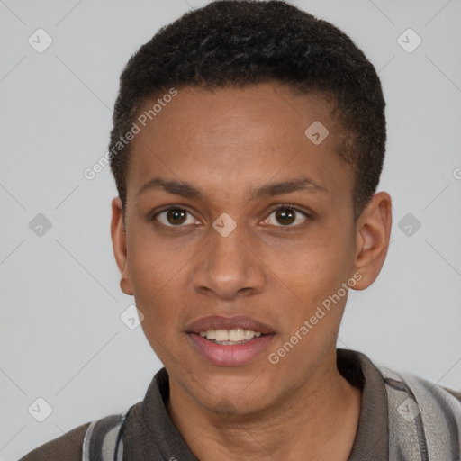 Joyful black young-adult male with short  brown hair and brown eyes