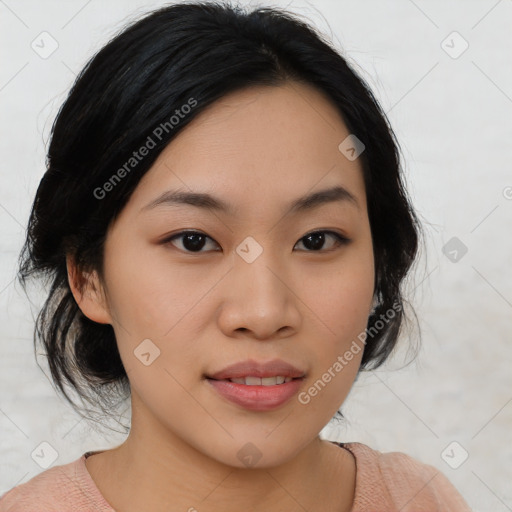 Joyful asian young-adult female with medium  black hair and brown eyes